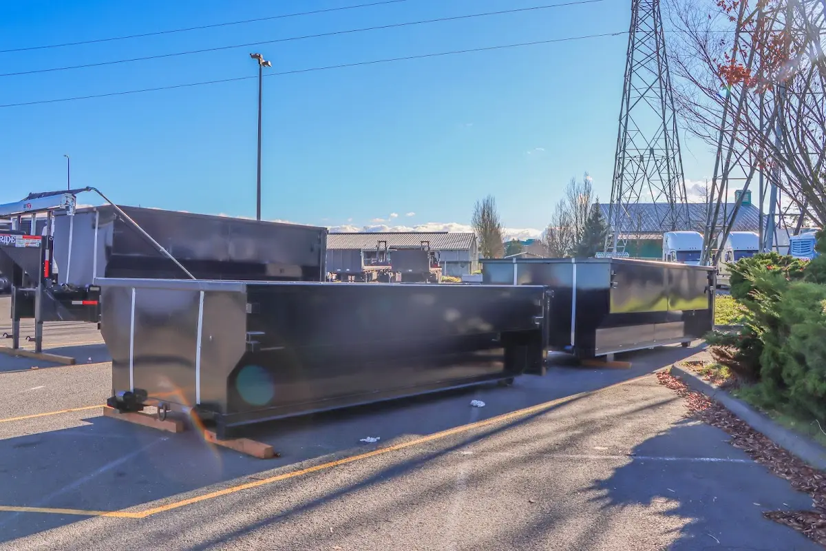 Roll-off dumpster ready for waste disposal at job site for Concrete Dumpster Rental in Maumee